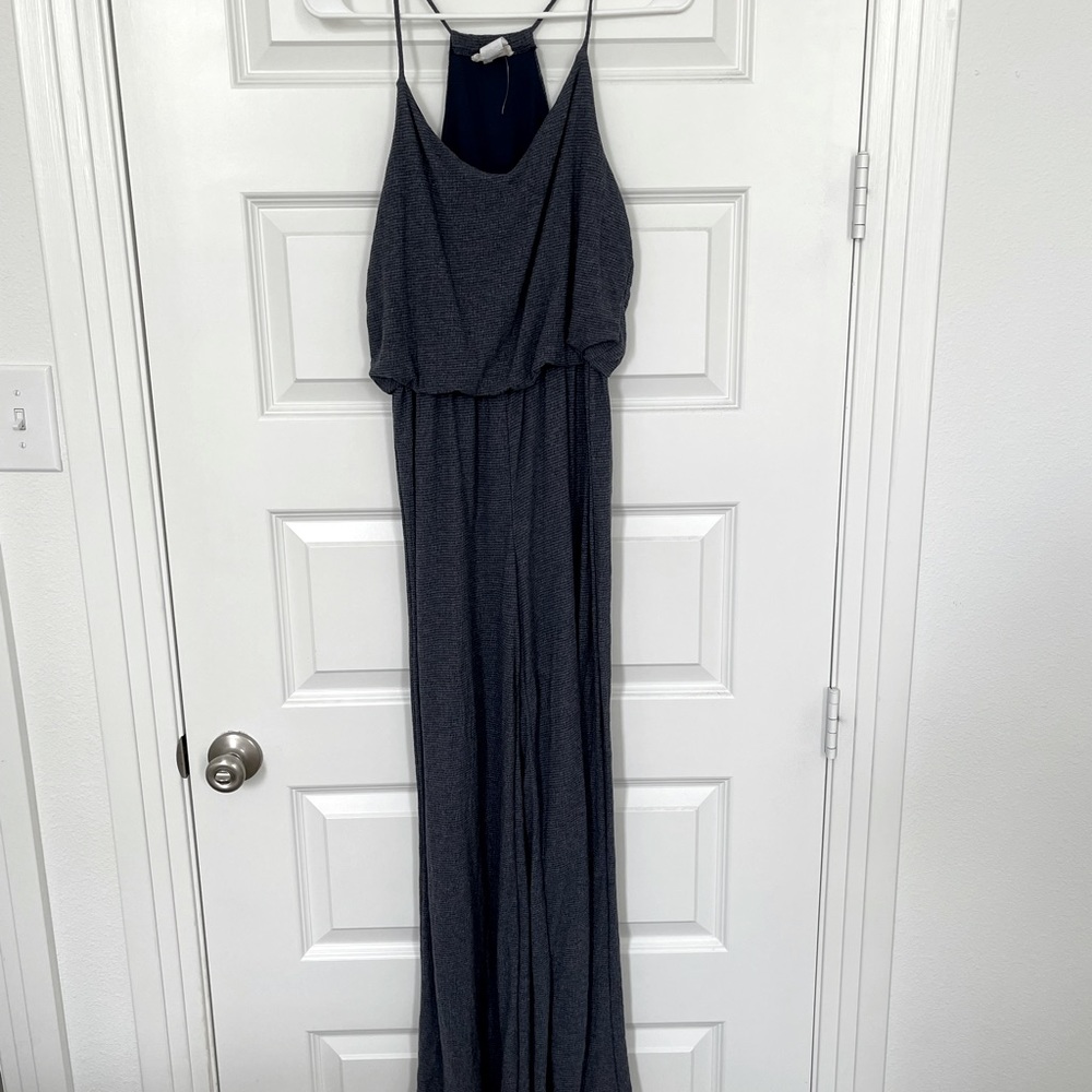 Navy blue jump suit. Never worn. Size M